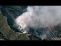 Live: Brush fire burns near the Getty Center