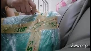 Unwrapping Coach Willow tote bag