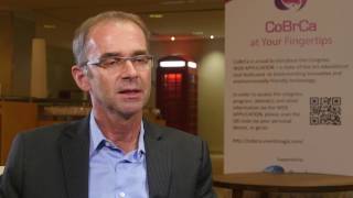 Which drug is more effective for the treatment of breast cancer: denosumab or bisphosphonates?