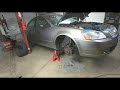 How to Replace an Altima Front Strut