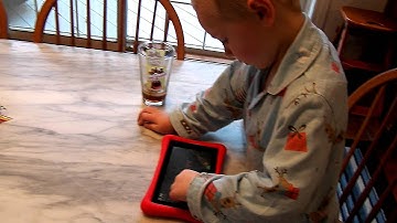 Boys playing with their tablets (having fun with Nabi & InnoTab)