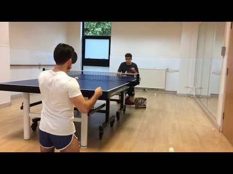 ben-&-harrie-playing-table-tennis-on-their-knees