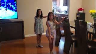 Kids are practicing gymnastics.  super flexible kids