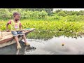 Best amazing fishing by hook in river  smart boy catching fish with bamboo tools hook trap 2023