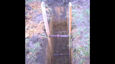 Mechanically excavated trial pit to determine soil conditions