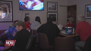 Lima residents gather to watch "The Game" and show their scarlet and grey pride