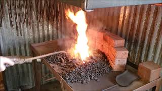 How to manage a coal forge fire.