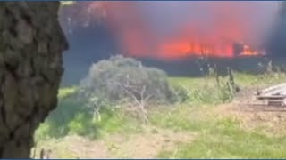 Controlled burn escalates, causes oil-filled barrels to explode near Creston