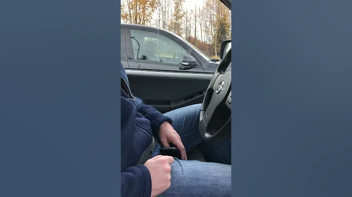 Guy Blowing His Instrument Hard at Stoplight