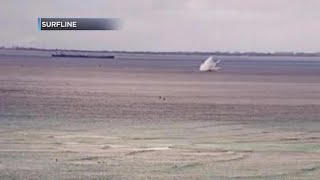 Pilot rescued by parasailer after ejecting from crashing plane