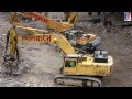 Komatsu PC 710, PC 400 LC in Detroit, Demolition Parking Garage, 2013.