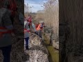 Volunteers fish for odd objects while cleaning up Scarborough Marsh