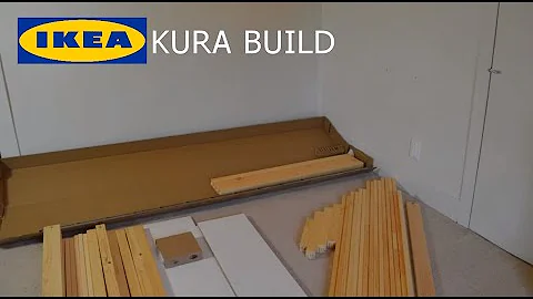 Putting Together the Kura IKEA Reversible Bed Assembly Upside Down 1 Man