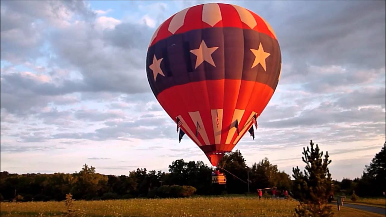 Hot air balloon landing in our front yard. YouTube