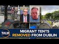 Massive influx of people  tents cleared from dublin canal as migrants offered state shelter