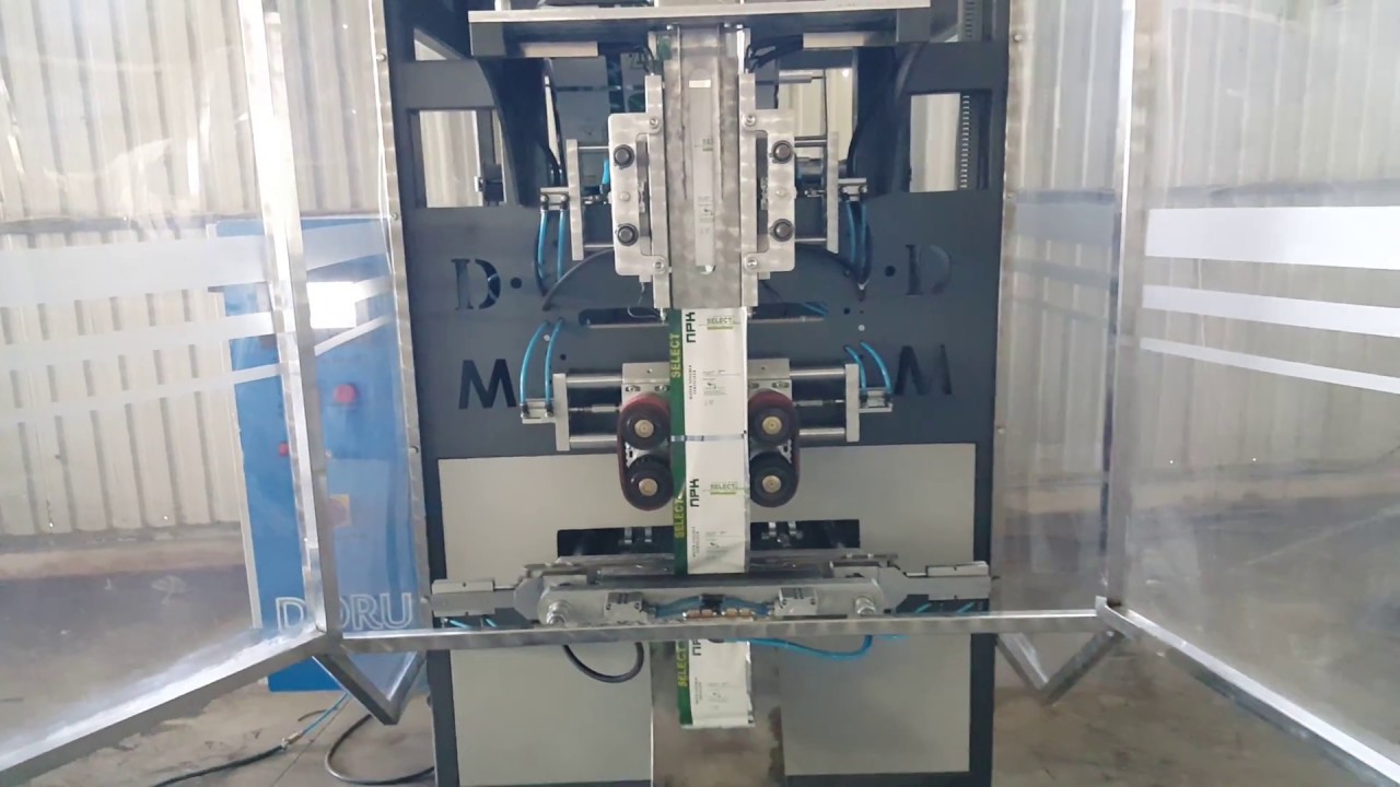 Quadro Packaging Machine by Auger - YouTube