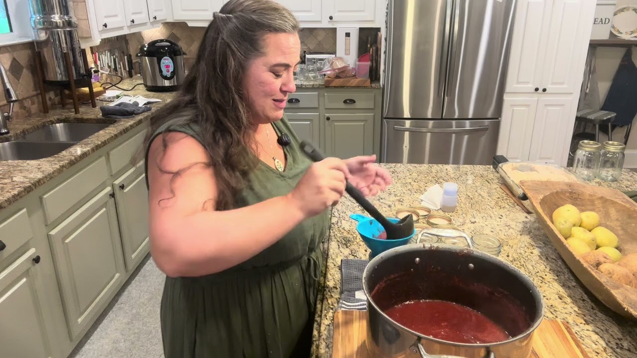 Easy strawberry jam and how to can it for long term storage using frozen strawberries.