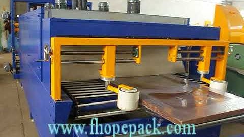 Door packing machine and panel shrinking machine