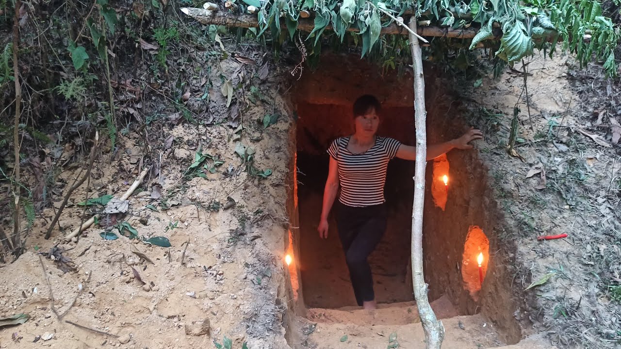 girl builds an underground shelter and survives alone in the forest ...
