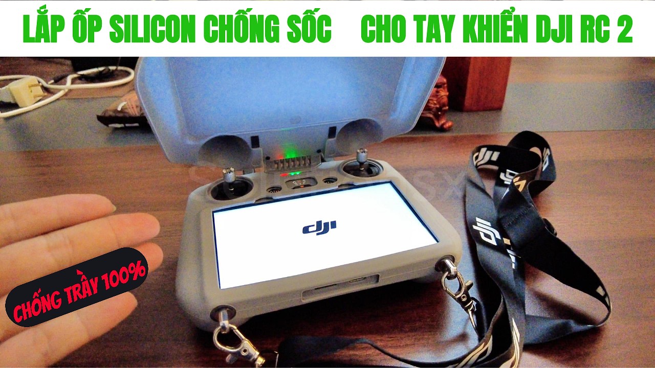 🎥 ⚒️ Video 372:  Cách lắp ốp silicon chống trầy xước cho điều khiển flycam DJI RC 2 | Solutionsx — Video review, click xem trên YouTube