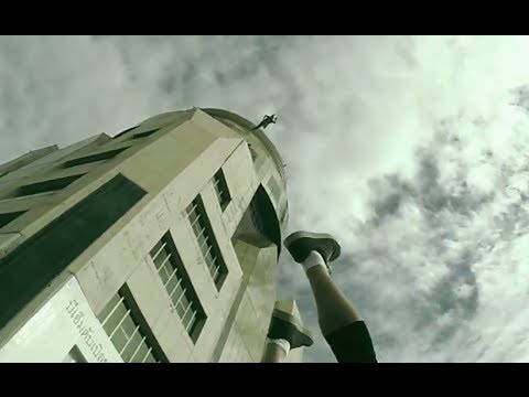 Base jump through building a house Base jump through building a house