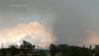 Helicopters battle wildfire on Hawaiis Oahu Island