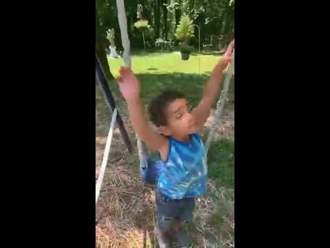 Teaching My Grandson How To Swing