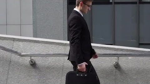 Businessman Walking On Stairs Stock Video