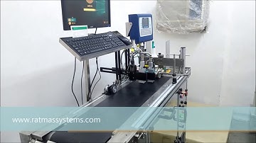 Vacuum Conveyor Belt with collection Conveyor for date code or Batch code Printing.