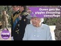 Queen gets the giggles discussing camouflage with troops