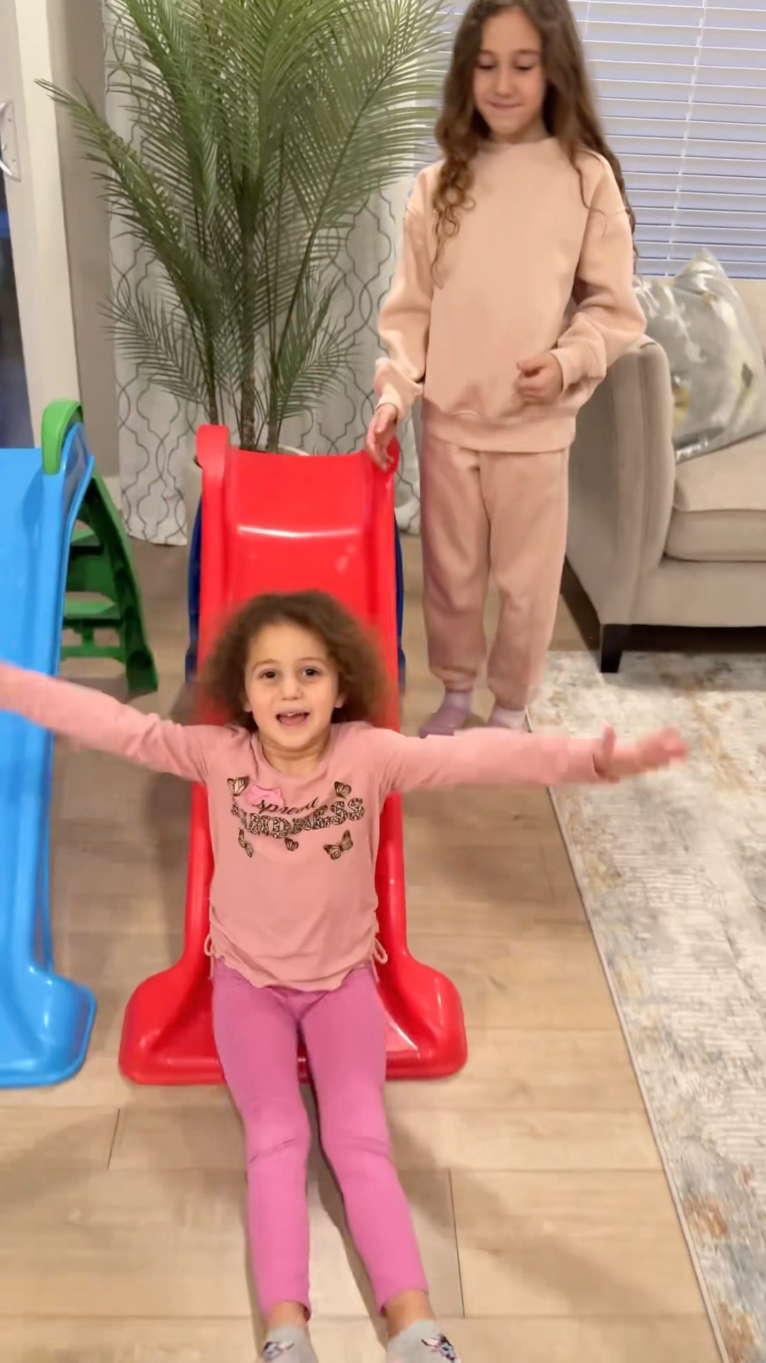 The kind sisters- Sierra shares with Rhia and fixes her broken slide- sharing is caring