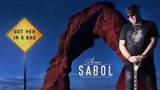 Armin Sabol - Got Her In A Bag (official video)
Renowned German guitarist, singer and producer Armin Sabol is back. This is the first single taken from his upcoming album Back In Blue which will be released via our sublabel Yellow Muffin Records. Armin is best known for his work as guitarist and songwriter for the German 80s Superstar Peter Schilling. He co-produced many hits including the world-wide No. 1 Song Major Tom, which sold more than six million copies!!
https://smarturl.it/pqfcgr
Get in touch with Armin Sabol:
FACEBOOK: https://www.facebook.com/Armin-Sabol-164380592919
INSTAGRAM: https://www.instagram.com/arminsabol/
SPOTIFY: https://open.spotify.com/artist/0zLUV4ntGfh7mw8TTJdCx4
WEBSITE: http://www.arminsabol.com
Get in touch with Yellow Muffin Records:
FACEBOOK: https://www.facebook.com/yellowmuffinrecords/
INSTAGRAM: https://www.instagram.com/yellowmuffinrecords/
MAIL: info@yellow-muffin.eu
Get in touch with Metalapolis Records:
SHOP: https://metalapolis.eu/shop/
FACEBOOK: https://www.facebook.com/MetalapolisRecords/
INSTAGRAM: https://www.instagram.com/metalapolis/
TWITTER: https://twitter.com/metalapolis
WEBSITE: https://metalapolis.eu
MAIL: info@metalapolis.eu
Got Her In A Bag
(Words & music: Armin Sabol, published by Shiva Songs Edition)
GOT HER WITH ME, GOT HER WITH ME IN A BAG
GOT HER WITH ME, GOT HER WITH ME IN A BAG
USED TO LOVE HER, BUT THIS TIME | COULDNT HOLD BACK
USED TO LOVE HER, BUT THIS TIME I COULDNT HOLD BACK
GOTTA RUN NOW, GOTTA RUN AND NOT LOOK BACK
GOTTA RUN NOW, GOTTA RUN AND NOT LOOK BACK
LORD FORGIVE ME, LORD FORGIVE ME IVE GONE MAD
LORD FORGIVE ME, NOW | GOT HER IN A BAG
NOW I GOT HER, NOW I GOT HER IN A BAG
GOT HER WITH ME IN A BAG
Guitars, vocals, organ and bass: Armin Sabol
Drums: Micha Kasper
#arminsabol #gotherinabag #backinblue Armin Sabol - Got Her In A Bag (official video)