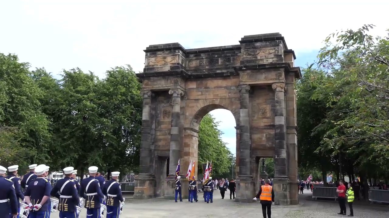Drum Major lobs mace over McLennan Arch