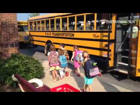 Bermudian Springs Elementary school students get off the bus for their first day of school.