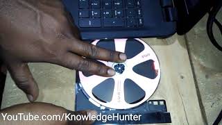 how to insert cd into hp laptop computer