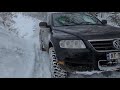 Touareg V8 climbing snowy hill