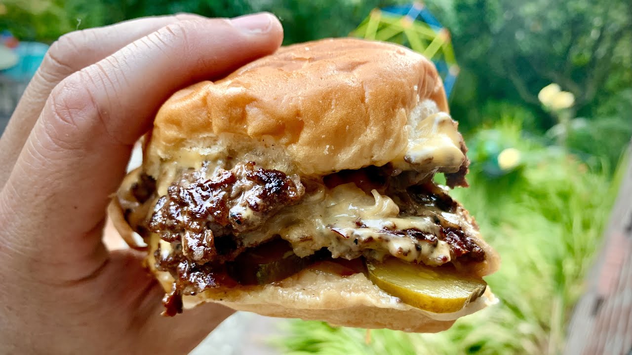 Peaky Blinders Manchester - Peaky Signature Burger ⁠ Ground brisket &  chunk steak patty, golden caramelised onions, black wax cheddar, shredded  lettuce and Peaky burger sauce. Perfectly paired with a cold pint