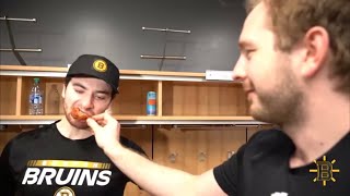Linus Ullmark gives Jeremy Swayman chicken after his 2nd straight shutout