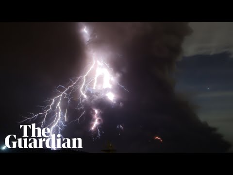 Taal volcano: lightning and giant plumes of smoke with 'explosive eruption' forecast