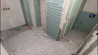 Elektryczne ogrzewanie podłogowe w łazience pod płytkami i na ścianie