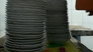 Cara mengelap piring dengan cepat.