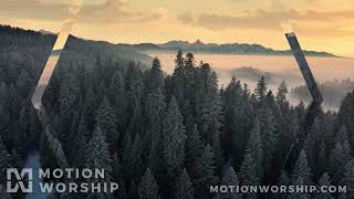 Winter Sunrise Mountain Peaks HD Loop by Motion Worship
Download at https://www.MotionWorship.com - The camera slowly flies over snowy pine-filled mountains with a beautiful golden sky at sunrise in this background. Winter Sunrise Mountain Peaks HD Loop by Motion Worship