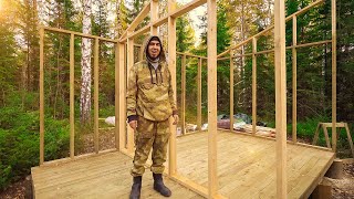 Building a house in the forest. Frame house. Cooking.