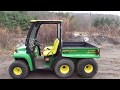 FOR SALE JOHN DEERE GATOR 6X4 DIESEL.WITH CURTIS CAB, NEW BATTERY AND SEATS.  $4,950