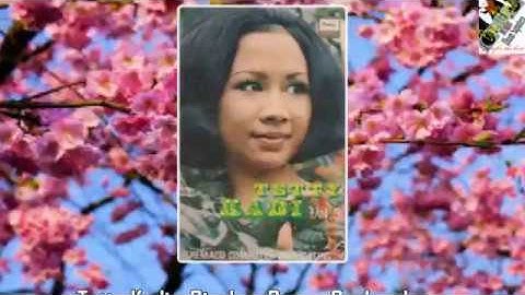 Tetty Kadi - Biarkan Bunga Berkembang (Lirik Lagu)