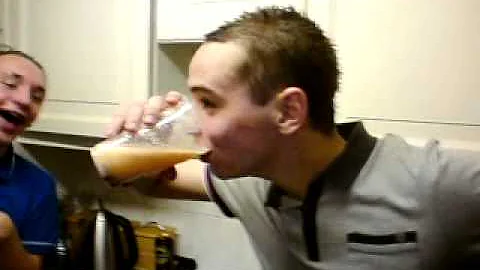 Scott Christie downing a cup of a bit of everythin...
