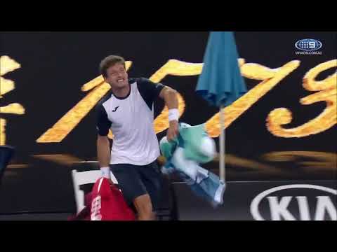 Pablo Carreno Busta madly throwing his bag and shouting at the Chair Umpire