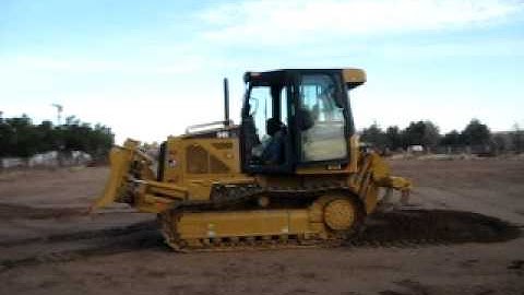 Santana Delao demonstrating start up procedures for Cat D4K xl Dozer