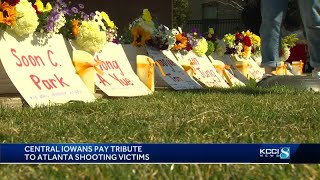 Community gathers at Sculpture Park to hold vigil for Atlanta-area shooting victims