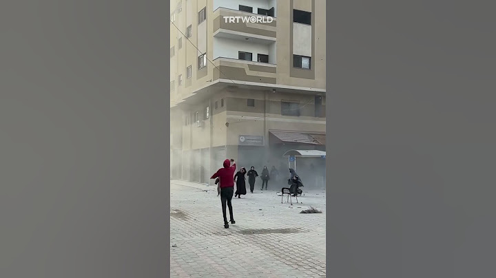 The moment Israel hit a residential building in Gaza as Palestinians were fleeing